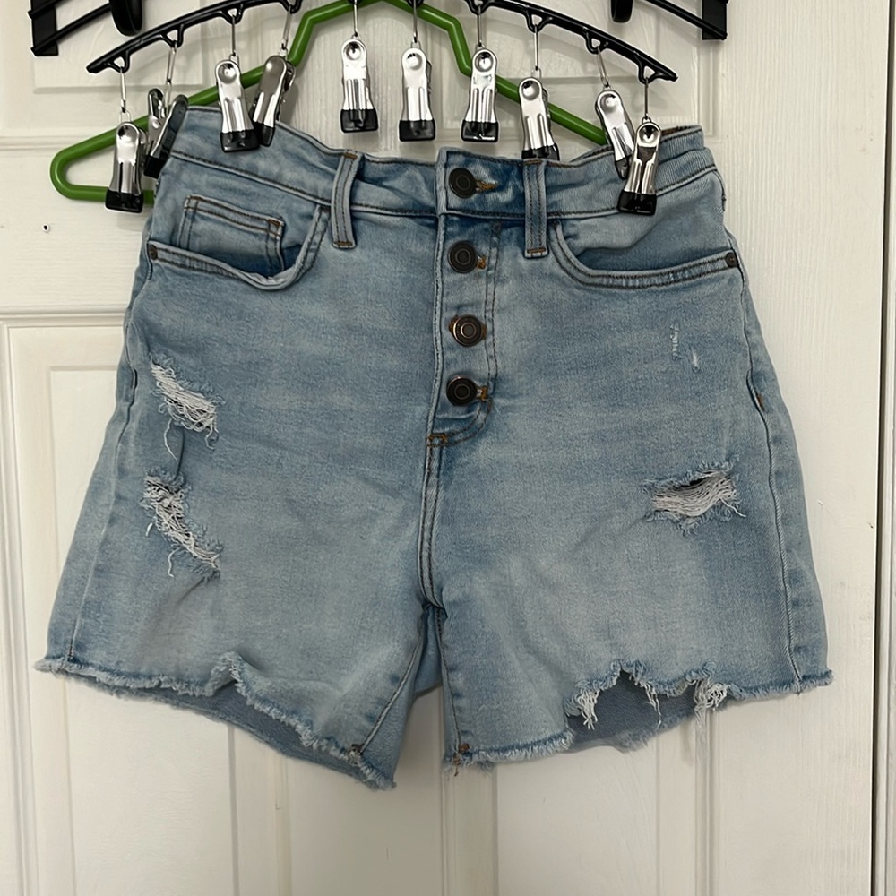 Women’s size 8 high waisted distressed Lauren Conrad Jean shorts.